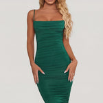 Oh Polly's Sierra Skye wearing the You're My Type Midi Dress in Green Slinky fabric perfect for summer garden parties