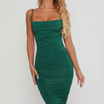 Oh Polly's Sierra Skye wearing the You're My Type Midi Dress in Green Slinky fabric perfect for elegant dinner dates