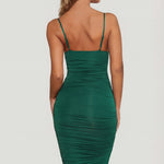 Oh Polly's Sierra Skye wearing the You're My Type Midi Dress in Green Slinky fabric perfect for elegant dinner dates