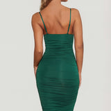 Oh Polly's Sierra Skye wearing the You're My Type Midi Dress in Green Slinky fabric perfect for elegant dinner dates